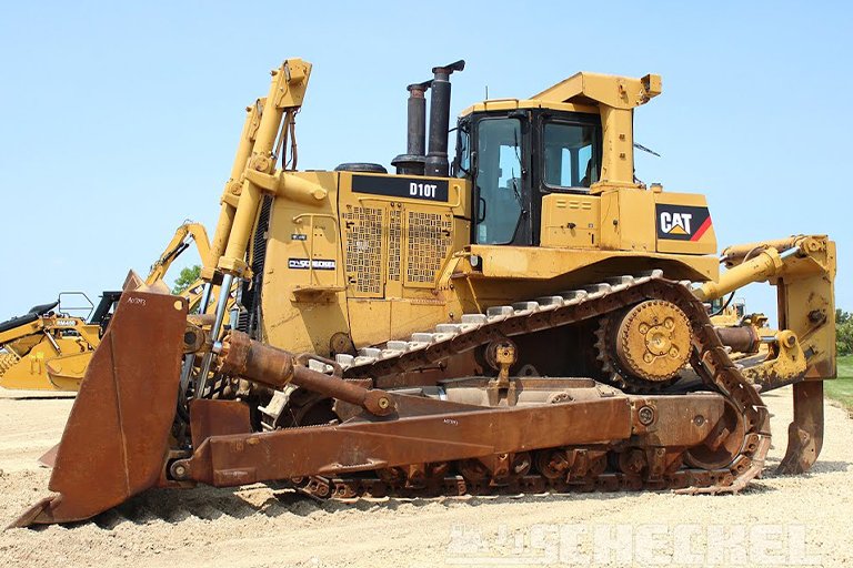 Crawler bulldozer pushing soil on construction site